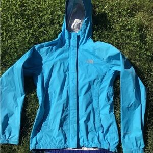 Aqua blue north face raincoat